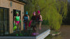 Lifestyle video filmed at a lakeside location featuring 4 models all wearing wild swimming gear